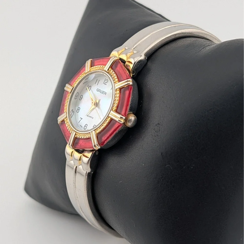 Gruen CR7183 Mother‎ of Pearl Dial Red lucite Bezel Two Tone Bangle Watch